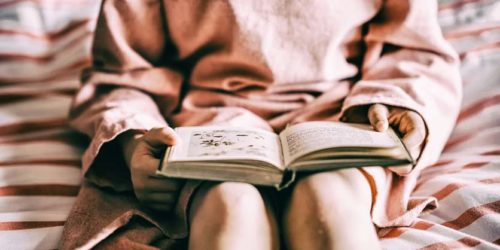 Girl reading book | free readability test